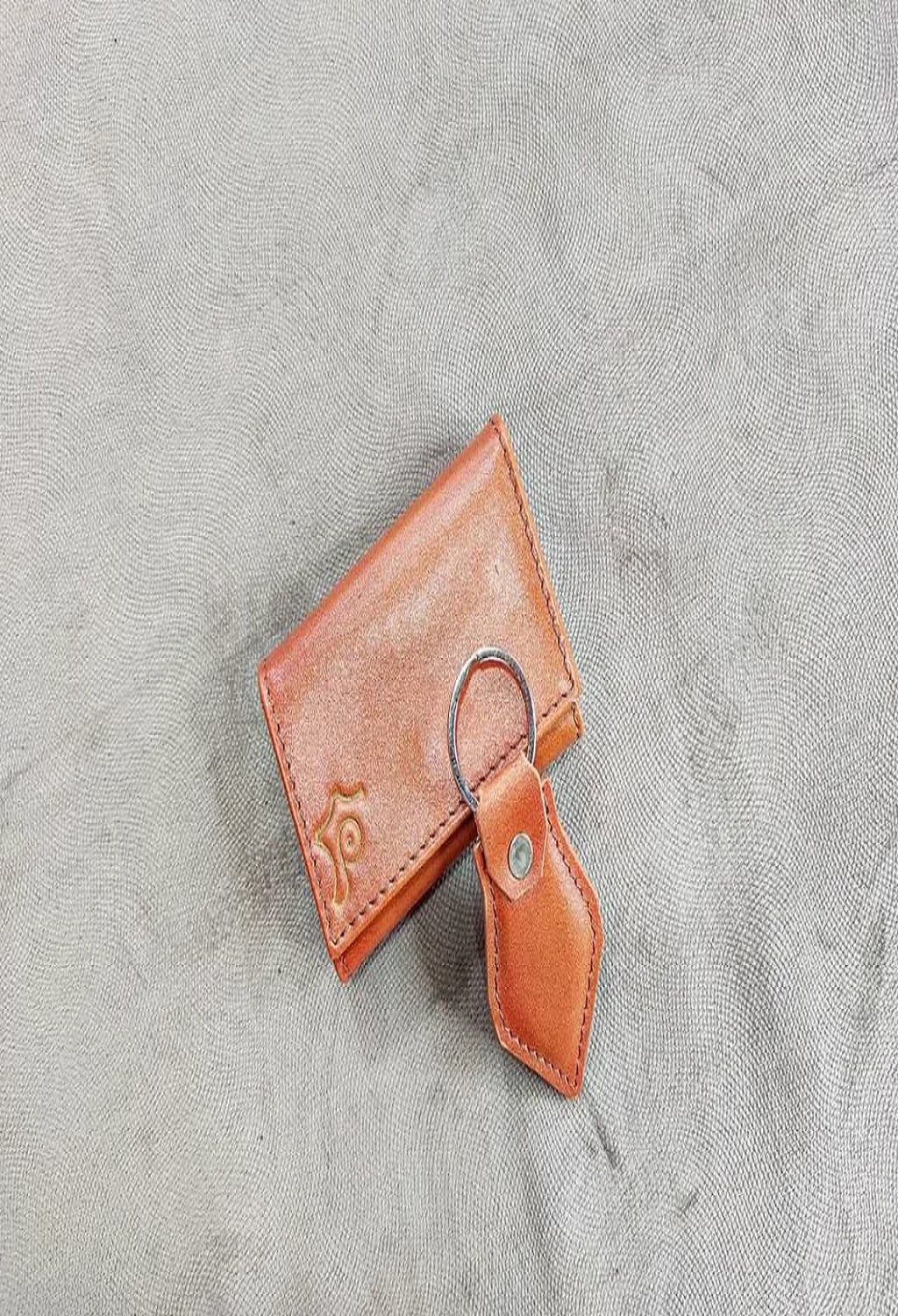 photo_2025-11-25_23-43-51 جاکارتی آکاردئونی و جاکلیدی چرم طبیعی گاوی - تصویر 1